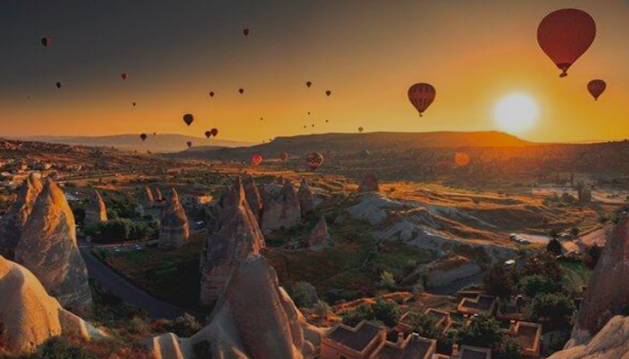 Cappadocia: Where the Sky Dances at Dawn.